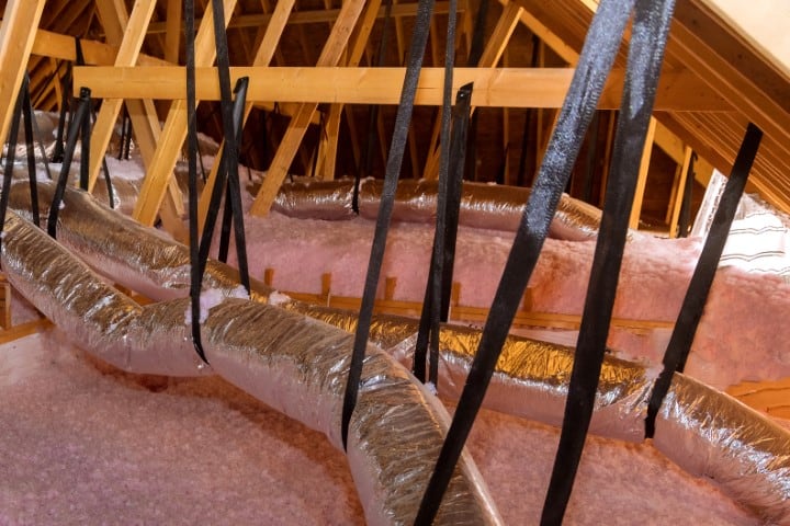 Attic Insulation & Ventilation With Deep Pink Fiberglass Blown in Insulation