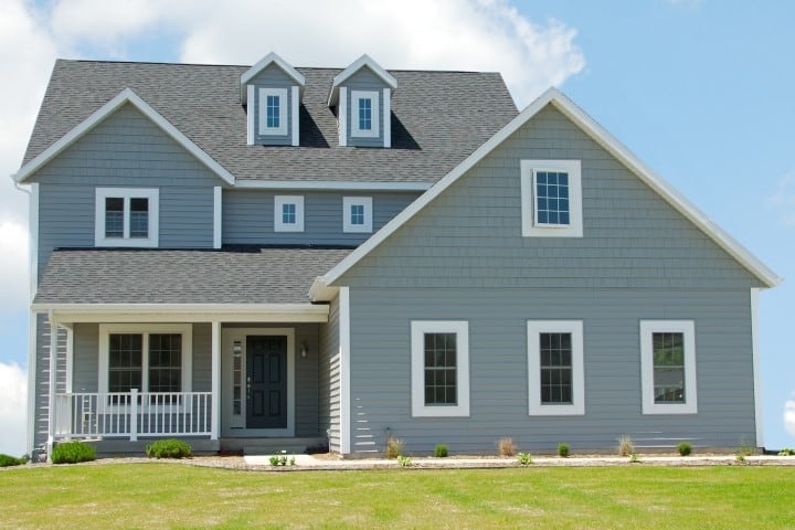 Beautiful Home With Composite Shake Siding Accents and Wide Fiber Cement Composite Siding.